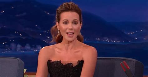 Kate Beckinsale poses topless in lacy underwear